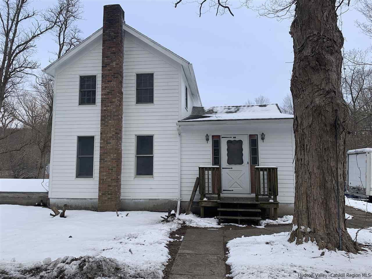 205 Union Center Road Ulster Park, NY 12487 - Photo 1 of 25 a front view of a house with windows