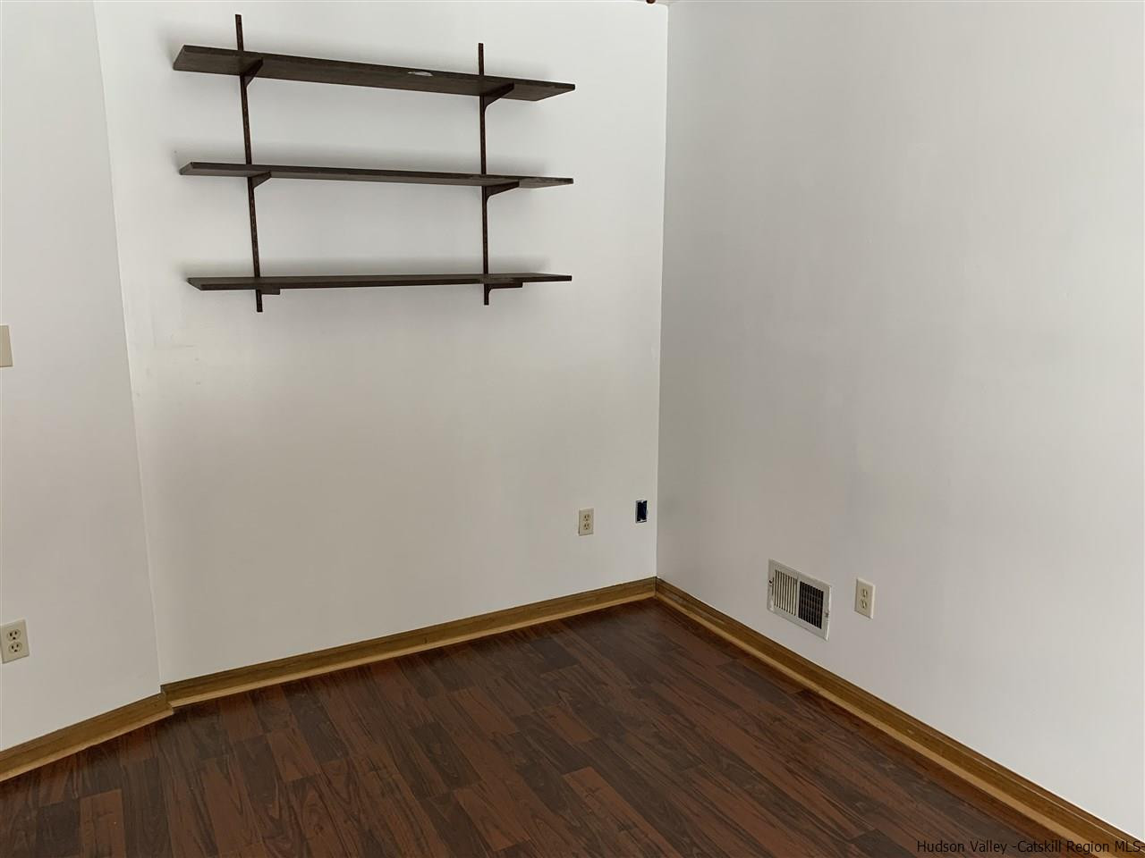 205 Union Center Road Ulster Park, NY 12487 - Photo 6 of 25 a view of an empty room with wooden floor