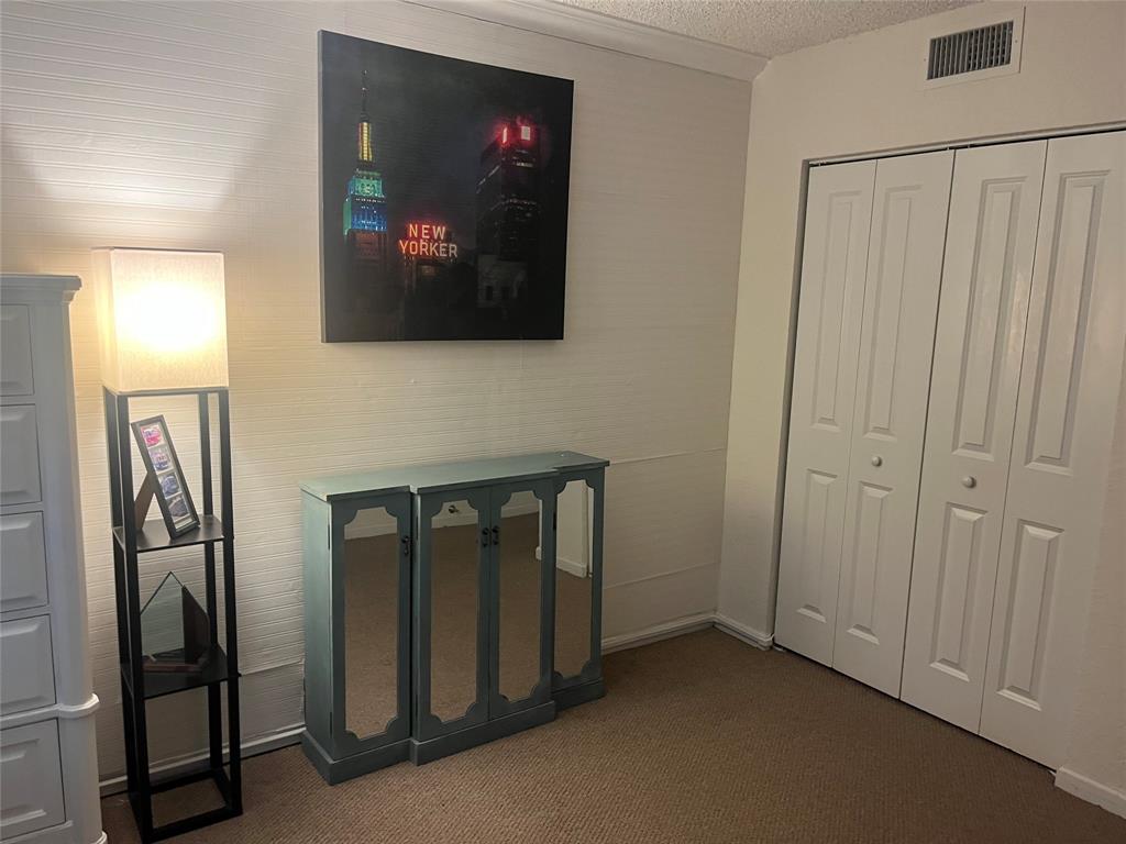 2660 Northeast 8th Avenue, Unit 208 Wilton Manors, FL 33334 - Photo 20 of 49 a view of a livingroom with a hallway