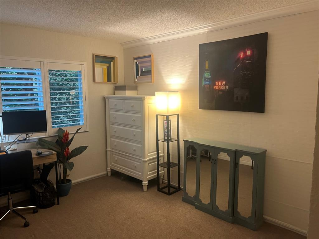 2660 Northeast 8th Avenue, Unit 208 Wilton Manors, FL 33334 - Photo 21 of 49 a view of a livingroom with workspace and a window