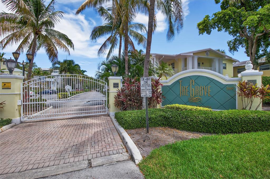 2660 Northeast 8th Avenue, Unit 208 Wilton Manors, FL 33334 - Photo 36 of 49 a view of a yard in front of a house