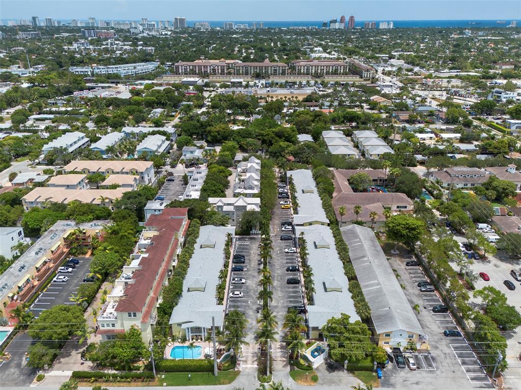 2660 Northeast 8th Avenue, Unit 208 Wilton Manors, FL 33334 - Photo 46 of 49 an aerial view of residential houses with outdoor space
