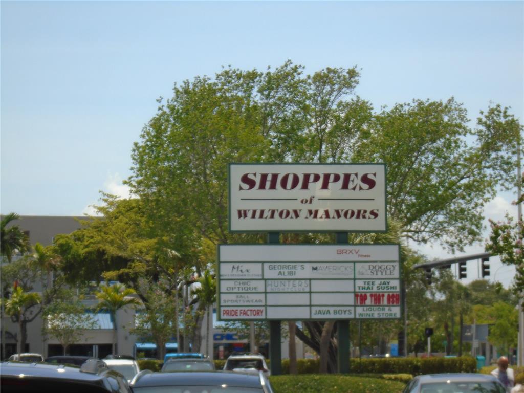 2660 Northeast 8th Avenue, Unit 208 Wilton Manors, FL 33334 - Photo 47 of 49 a sign on the side of a street