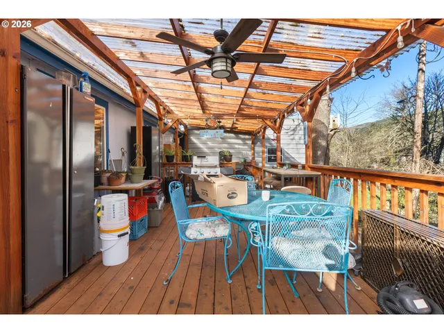 a balcony with furniture and outdoor view