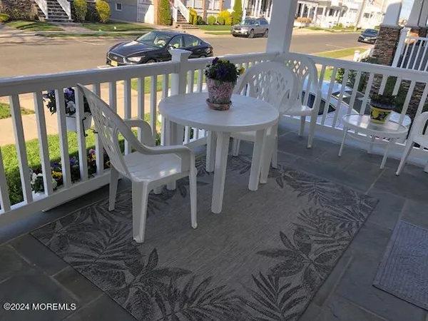 a view of a house with a yard and plants