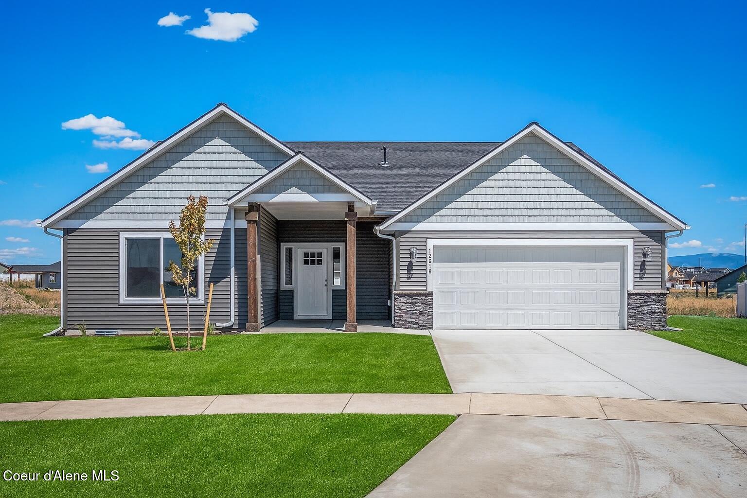 6731 West Plant Lane Rathdrum, ID 83858 - Photo 1 of 22 Powderhorn Bay Stock photo1 Front