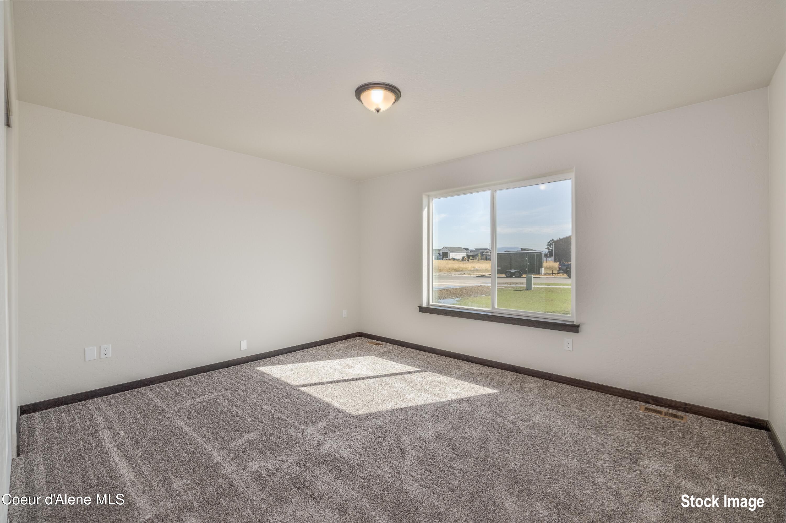 6731 West Plant Lane Rathdrum, ID 83858 - Photo 20 of 22 19 Guest Bedroom
