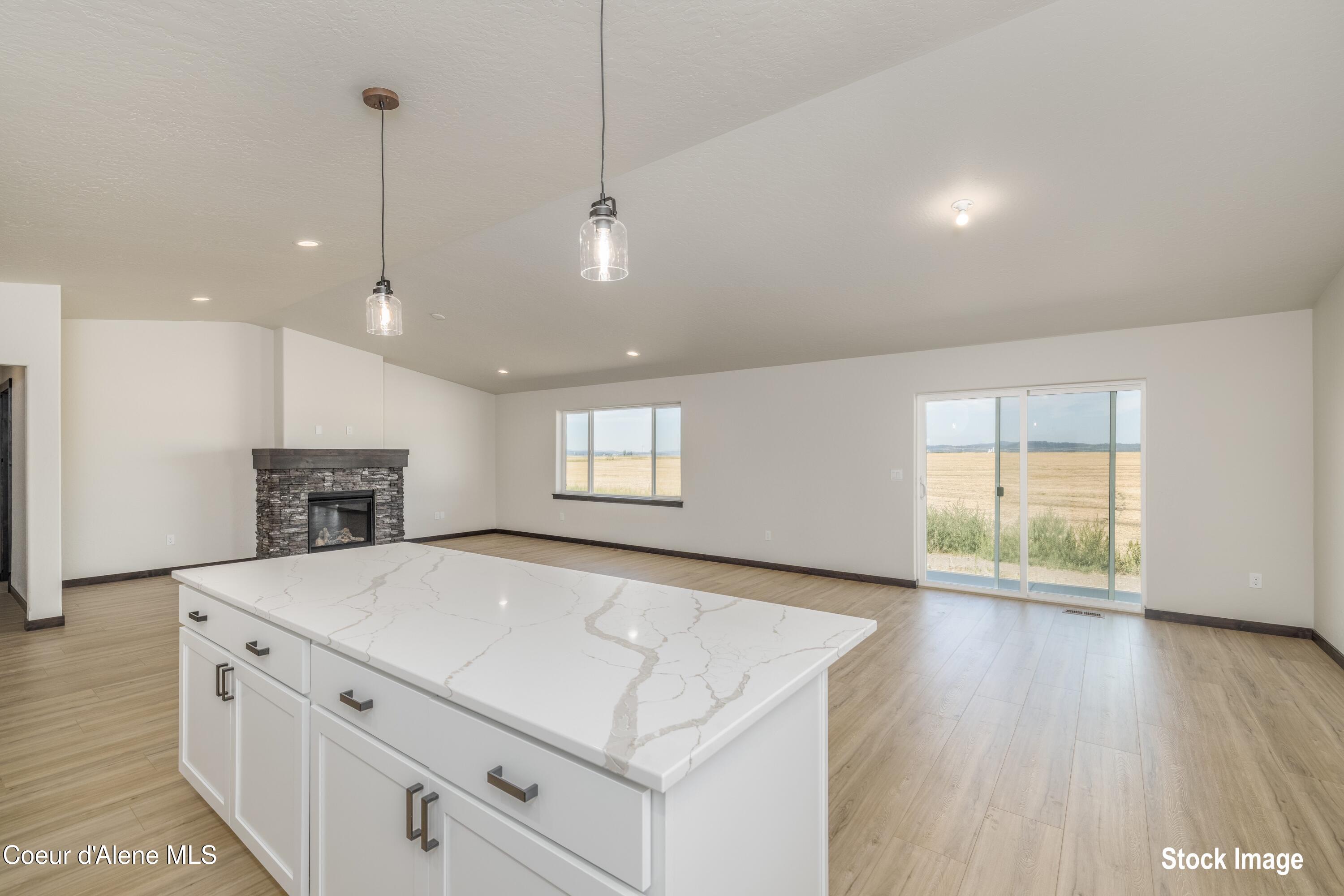 6731 West Plant Lane Rathdrum, ID 83858 - Photo 7 of 22 6 Kitchen Island Living