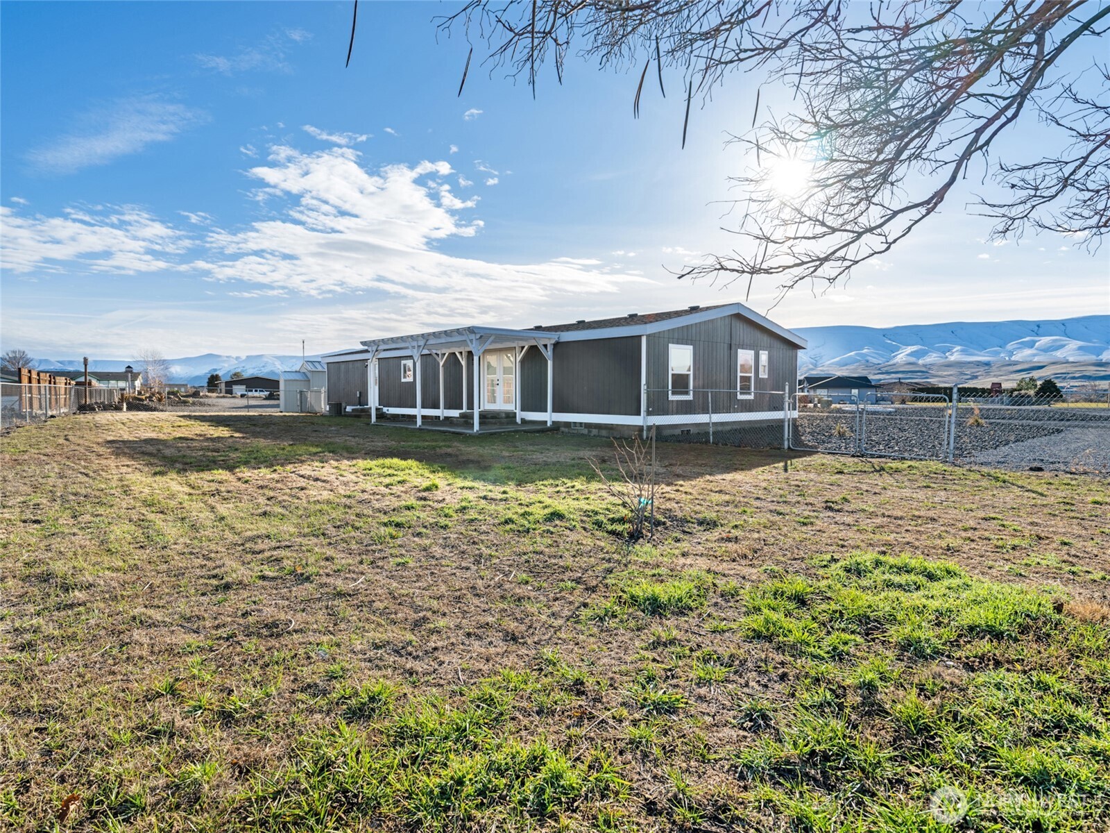 734 Lakeside Way Mattawa, WA 99349 - Photo 31 of 34 a view of a house with a yard and lake view
