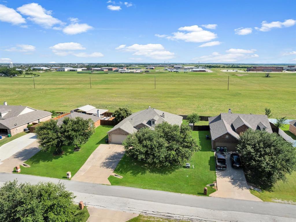 205 King George Road Ponder, TX 76259 - Photo 3 of 32 an aerial view of a house with a lake view