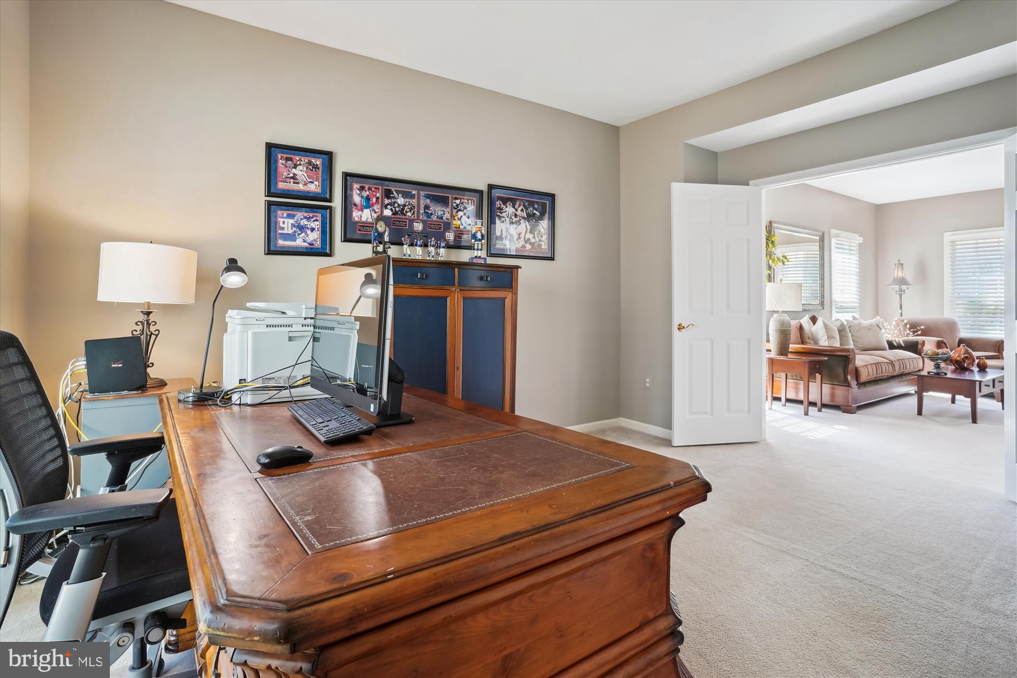 8535 Oak Chase Circle Fairfax Station, VA 22039 - Photo 16 of 62 a living room with furniture and a flat screen tv