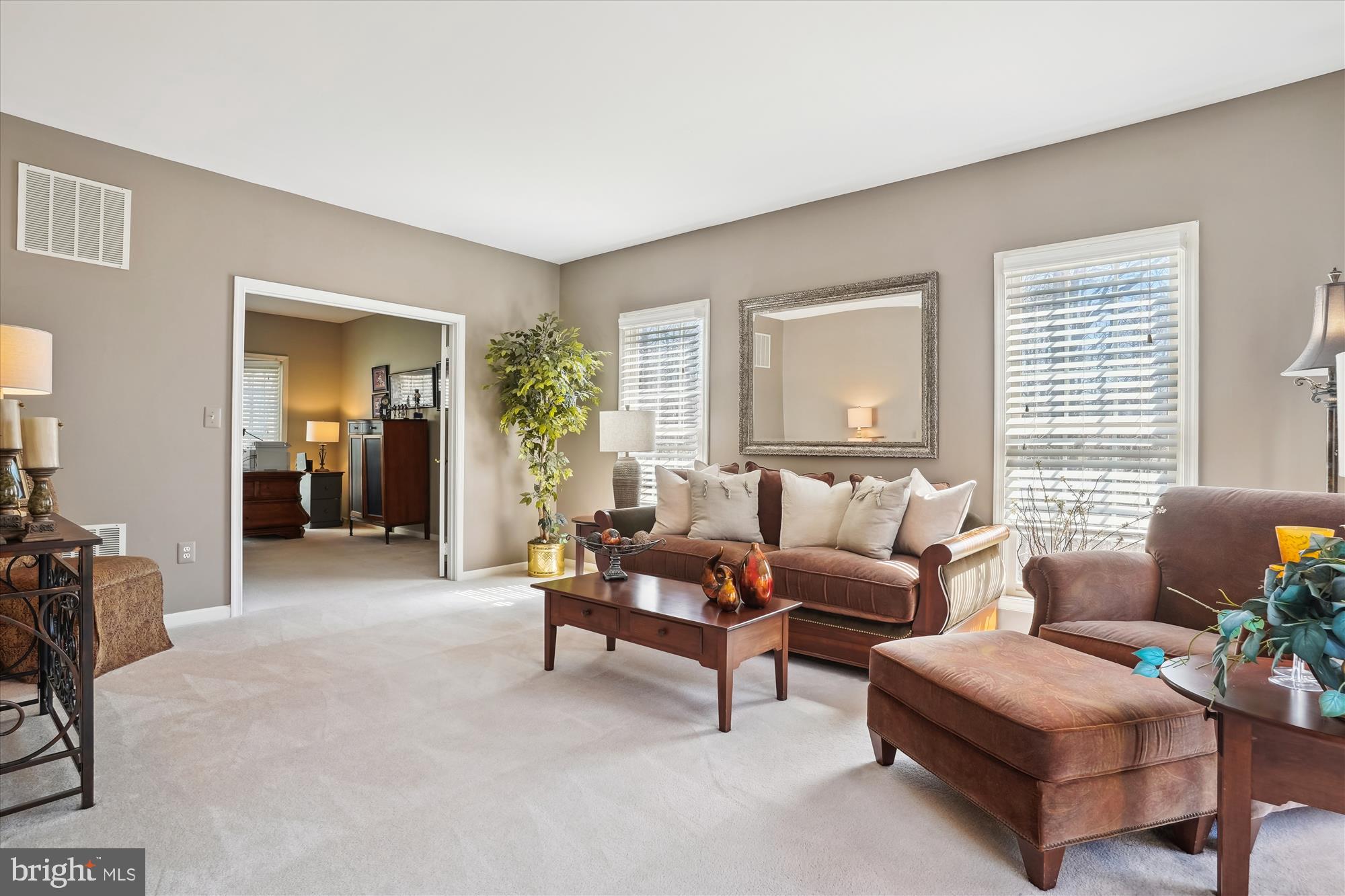 8535 Oak Chase Circle Fairfax Station, VA 22039 - Photo 17 of 62 a living room with furniture and a large window