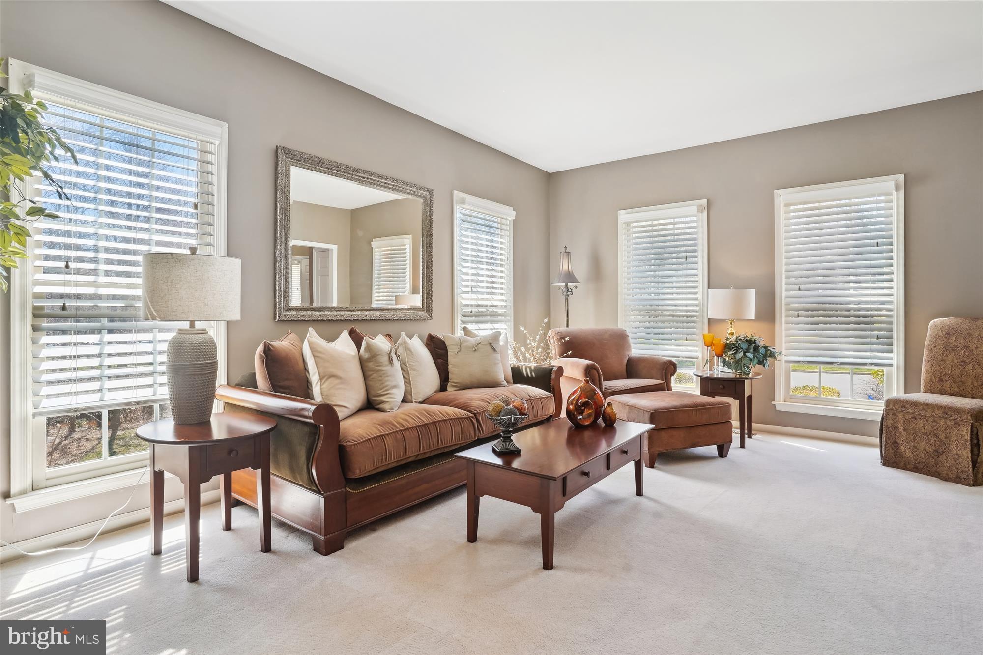 8535 Oak Chase Circle Fairfax Station, VA 22039 - Photo 18 of 62 a living room with furniture and a large window