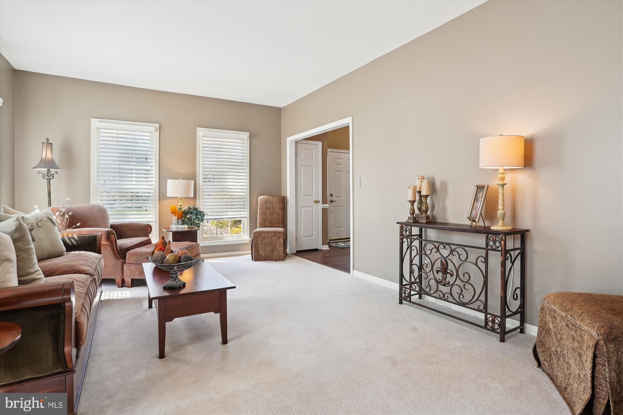 8535 Oak Chase Circle Fairfax Station, VA 22039 - Photo 19 of 62 a living room with furniture and a large window
