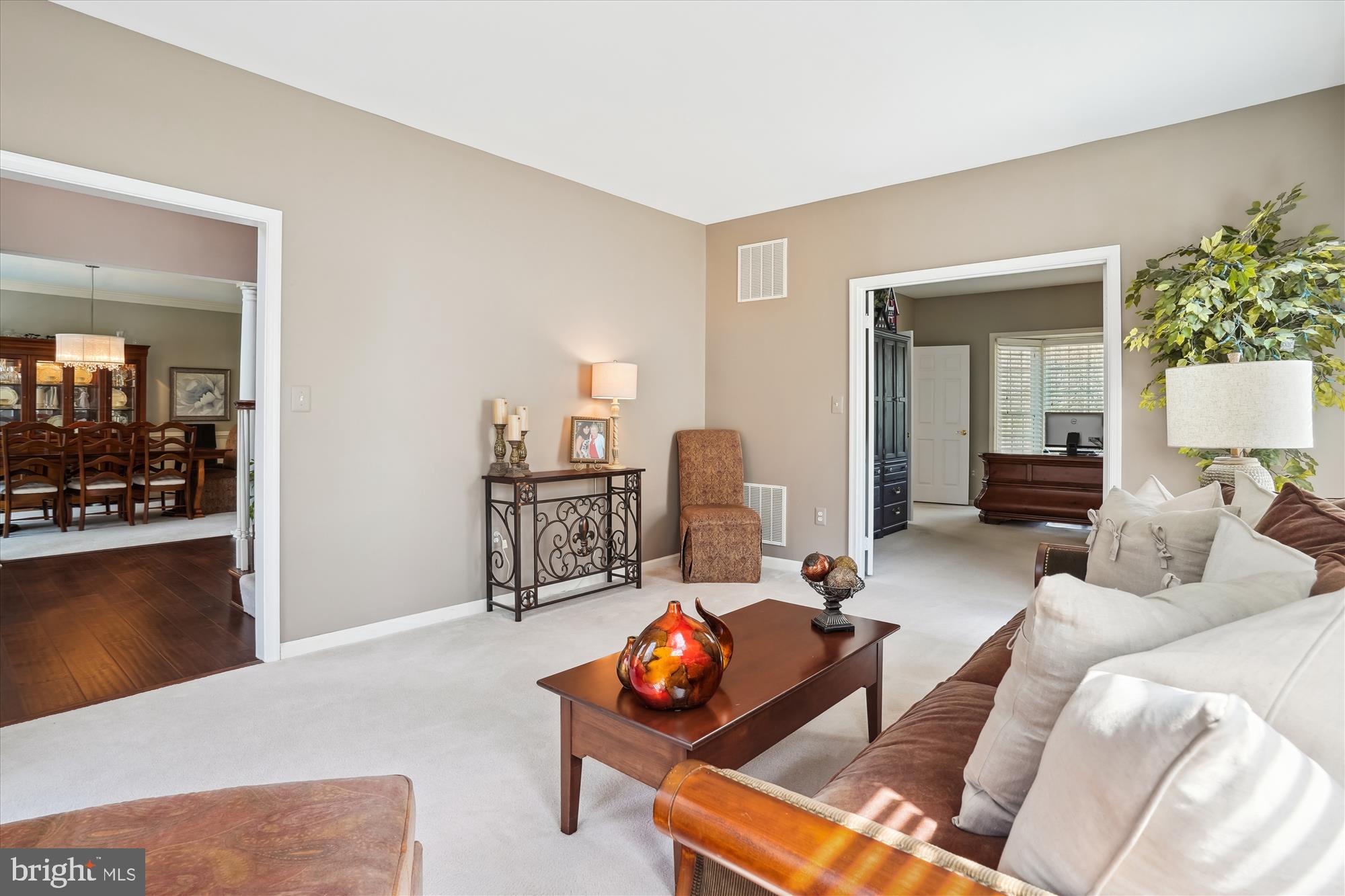 8535 Oak Chase Circle Fairfax Station, VA 22039 - Photo 20 of 62 a living room with furniture and a wooden floor