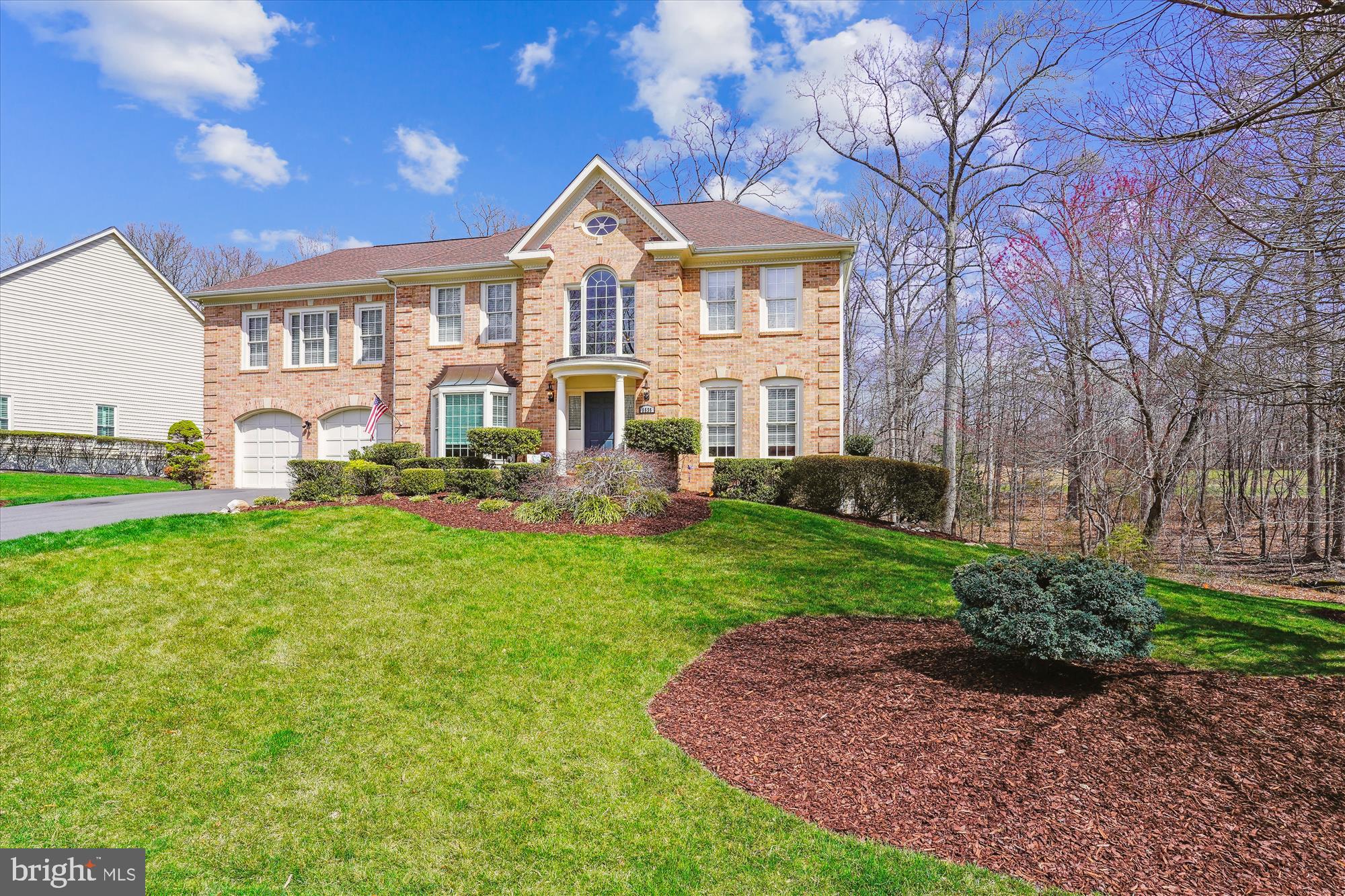 8535 Oak Chase Circle Fairfax Station, VA 22039 - Photo 2 of 62 a front view of a house with a yard