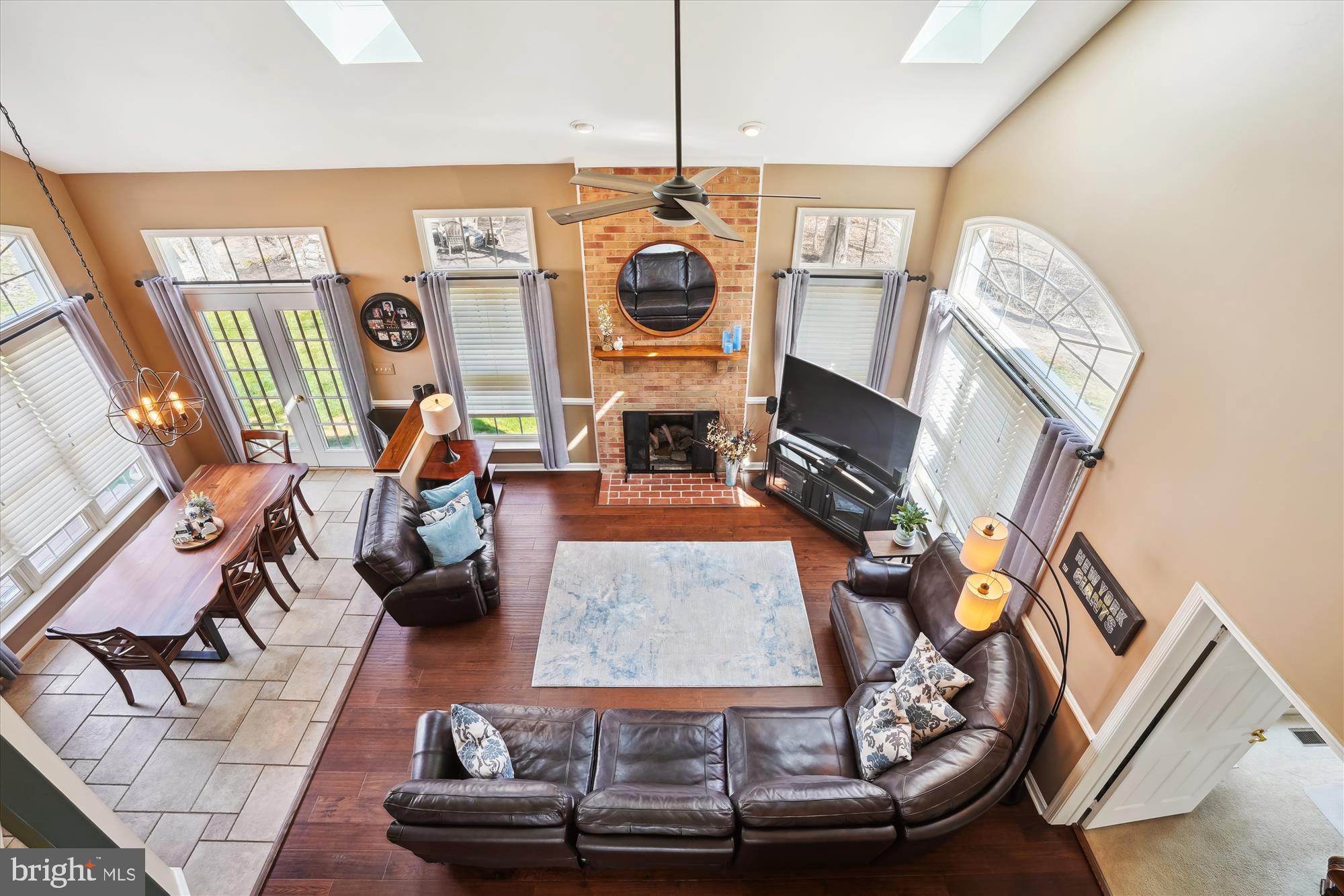 8535 Oak Chase Circle Fairfax Station, VA 22039 - Photo 28 of 62 a living room with furniture and a fireplace