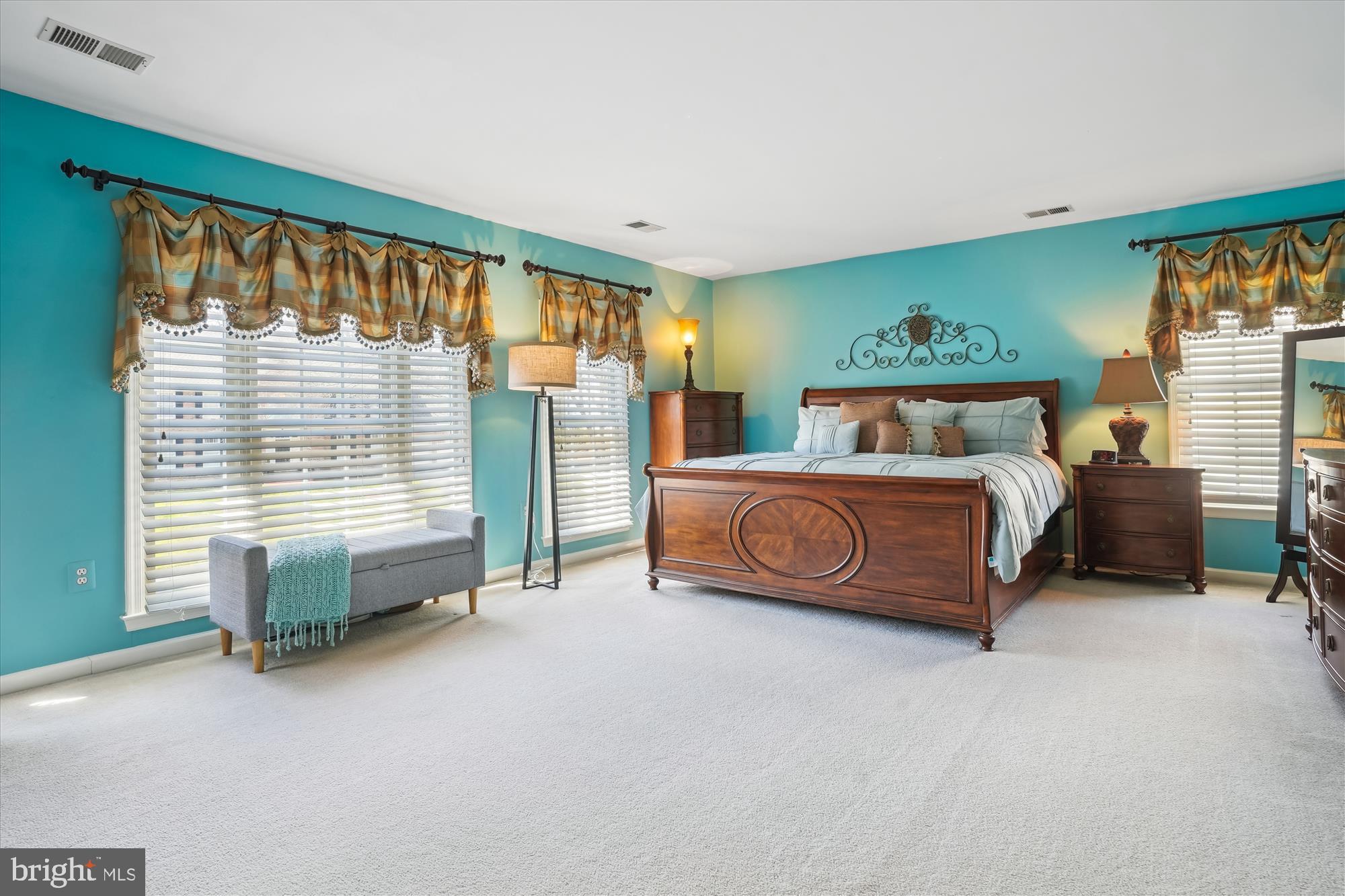 8535 Oak Chase Circle Fairfax Station, VA 22039 - Photo 29 of 62 a bedroom with a bed and a large window