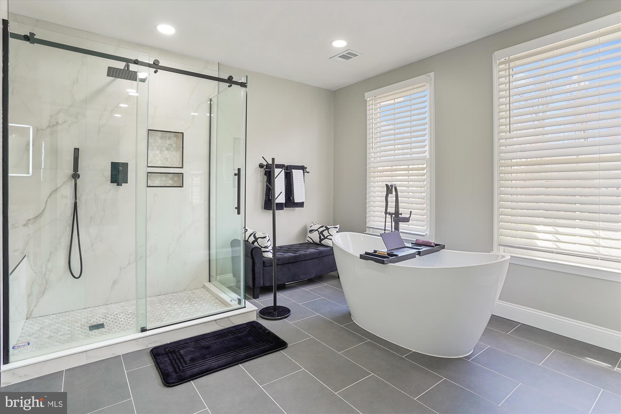 8535 Oak Chase Circle Fairfax Station, VA 22039 - Photo 34 of 62 a living room with a couch and a table