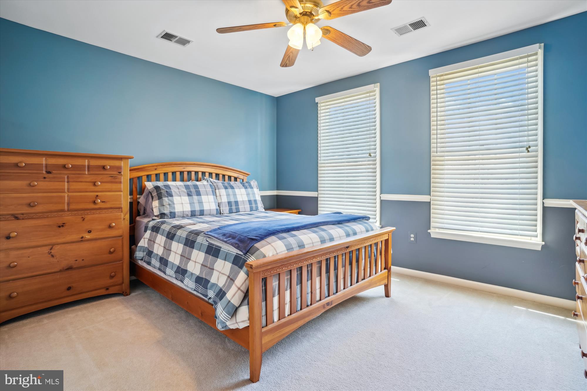 8535 Oak Chase Circle Fairfax Station, VA 22039 - Photo 40 of 62 a bedroom with a bed a window and closet