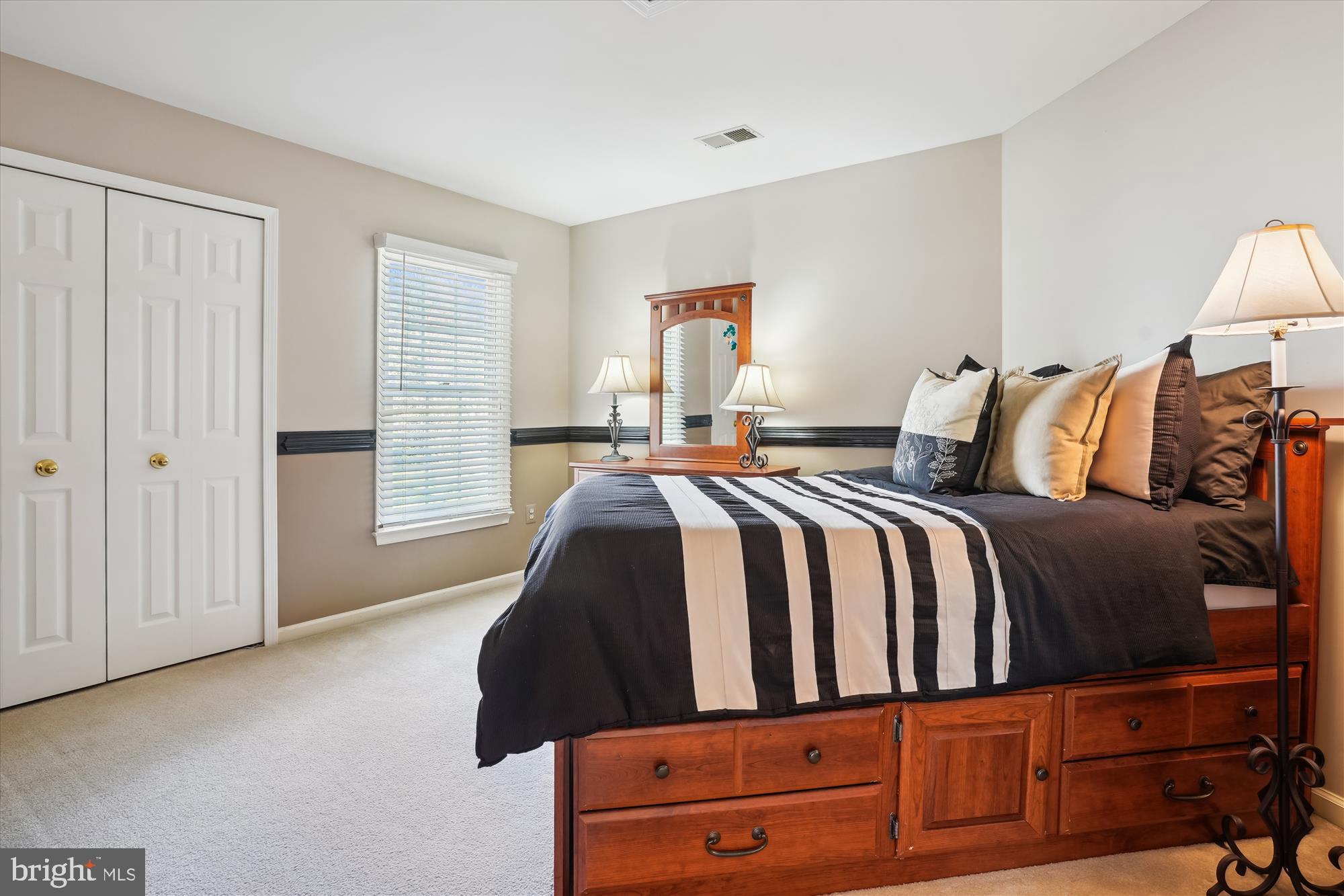 8535 Oak Chase Circle Fairfax Station, VA 22039 - Photo 42 of 62 a bedroom with a bed and window