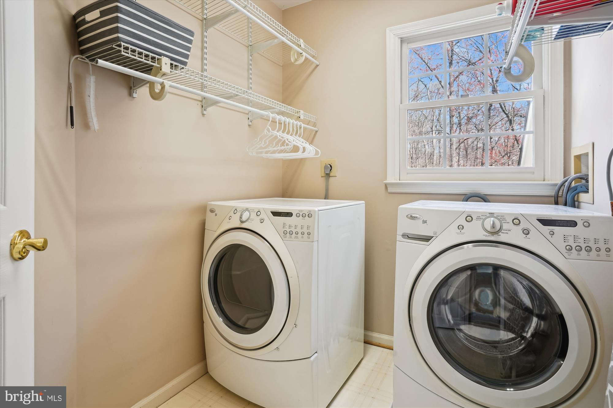 8535 Oak Chase Circle Fairfax Station, VA 22039 - Photo 45 of 62 a utility room with dryer and washer