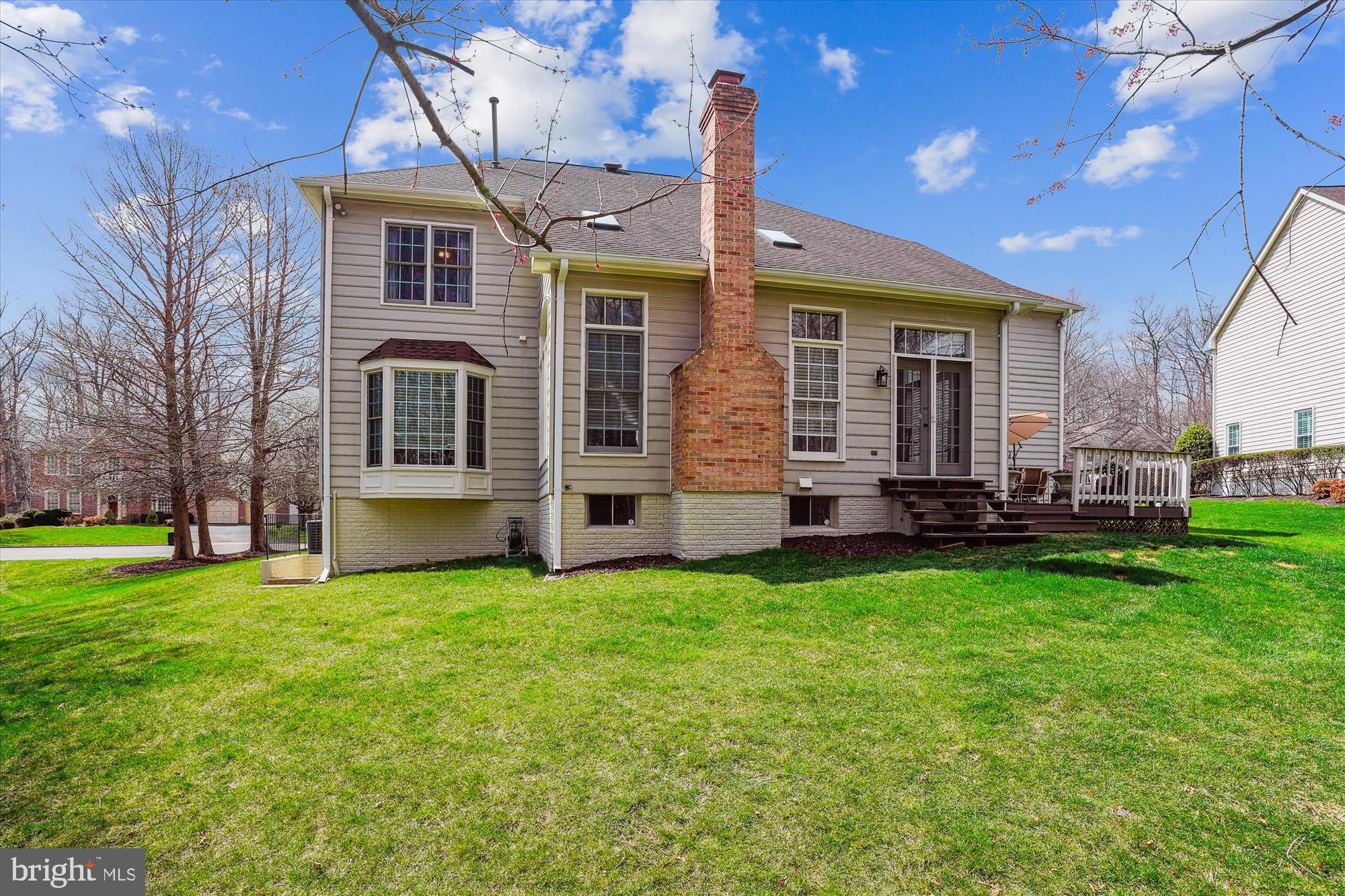 8535 Oak Chase Circle Fairfax Station, VA 22039 - Photo 50 of 62 a view of a house with a backyard
