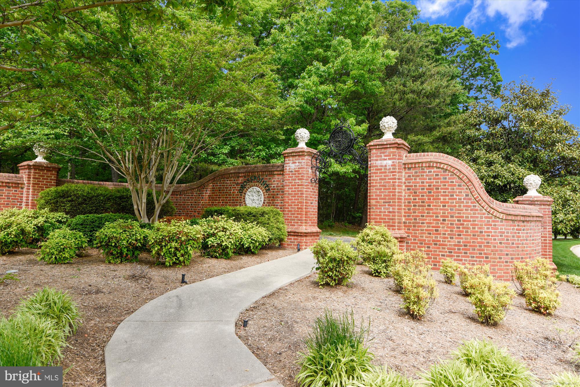 8535 Oak Chase Circle Fairfax Station, VA 22039 - Photo 54 of 62 a view of a house with a yard and potted plants