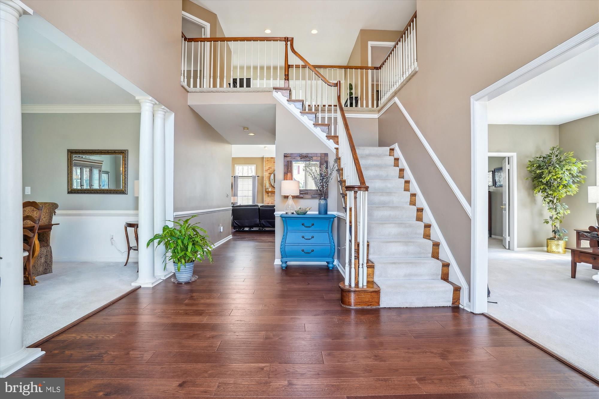 8535 Oak Chase Circle Fairfax Station, VA 22039 - Photo 6 of 62 a view of entryway and hall with wooden floor