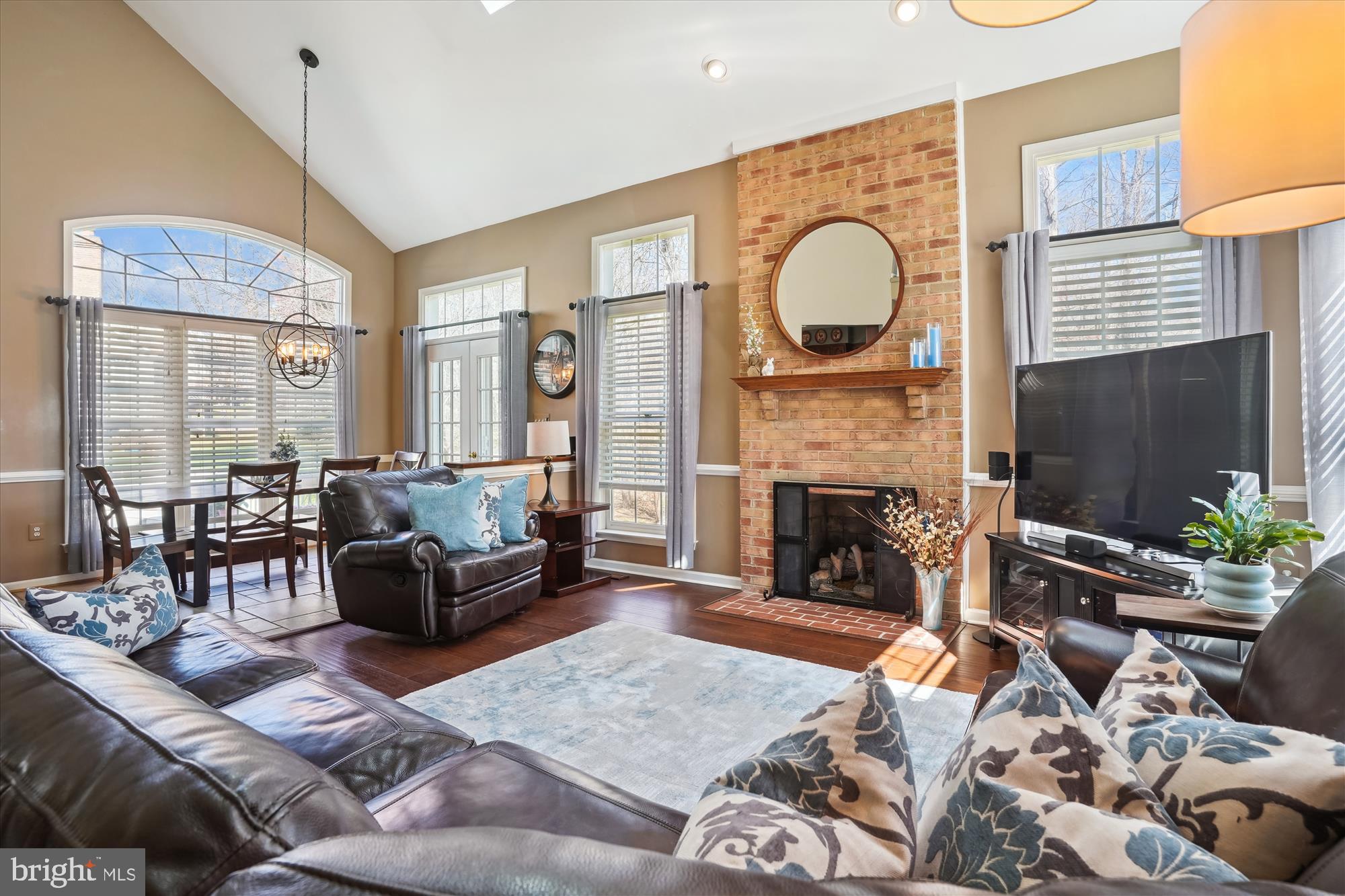8535 Oak Chase Circle Fairfax Station, VA 22039 - Photo 7 of 62 a living room with furniture fireplace and a fireplace