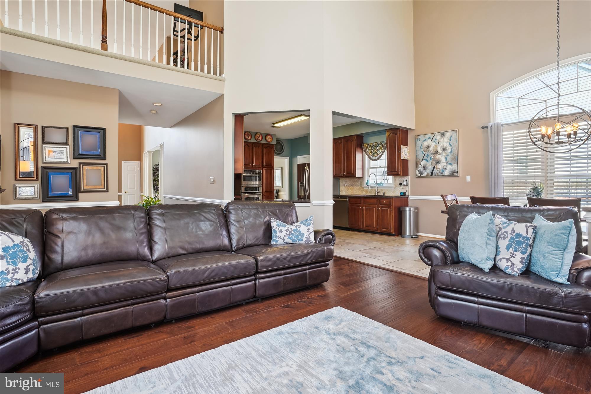 8535 Oak Chase Circle Fairfax Station, VA 22039 - Photo 8 of 62 a living room with furniture and a large window