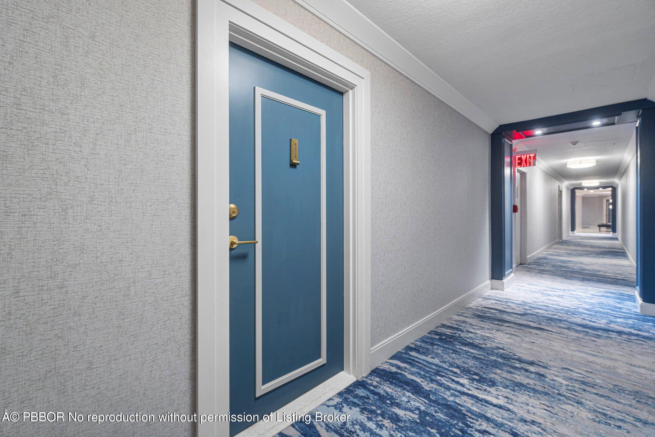 44 Cocoanut Row, Unit 526B Palm Beach, FL 33480 - Photo 19 of 33 a view of a hallway with wooden floor