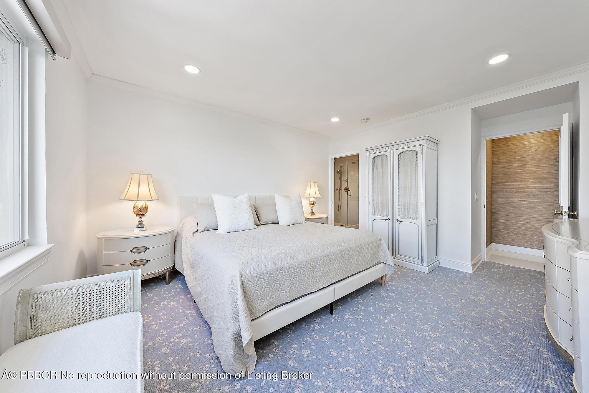 44 Cocoanut Row, Unit 526B Palm Beach, FL 33480 - Photo 6 of 33 a spacious bedroom with a bed and a couch