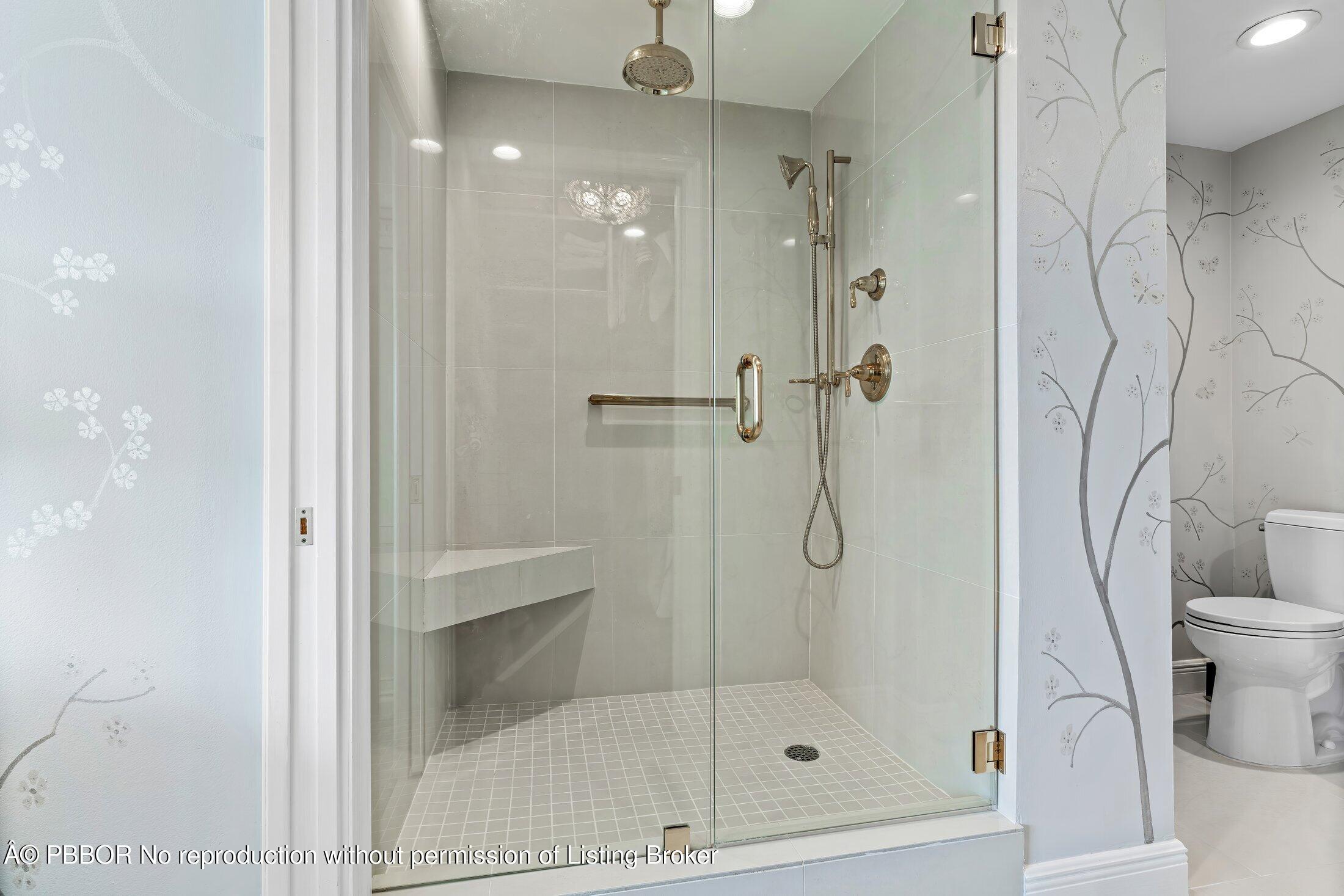 44 Cocoanut Row, Unit 526B Palm Beach, FL 33480 - Photo 9 of 33 a bathroom with a glass shower door