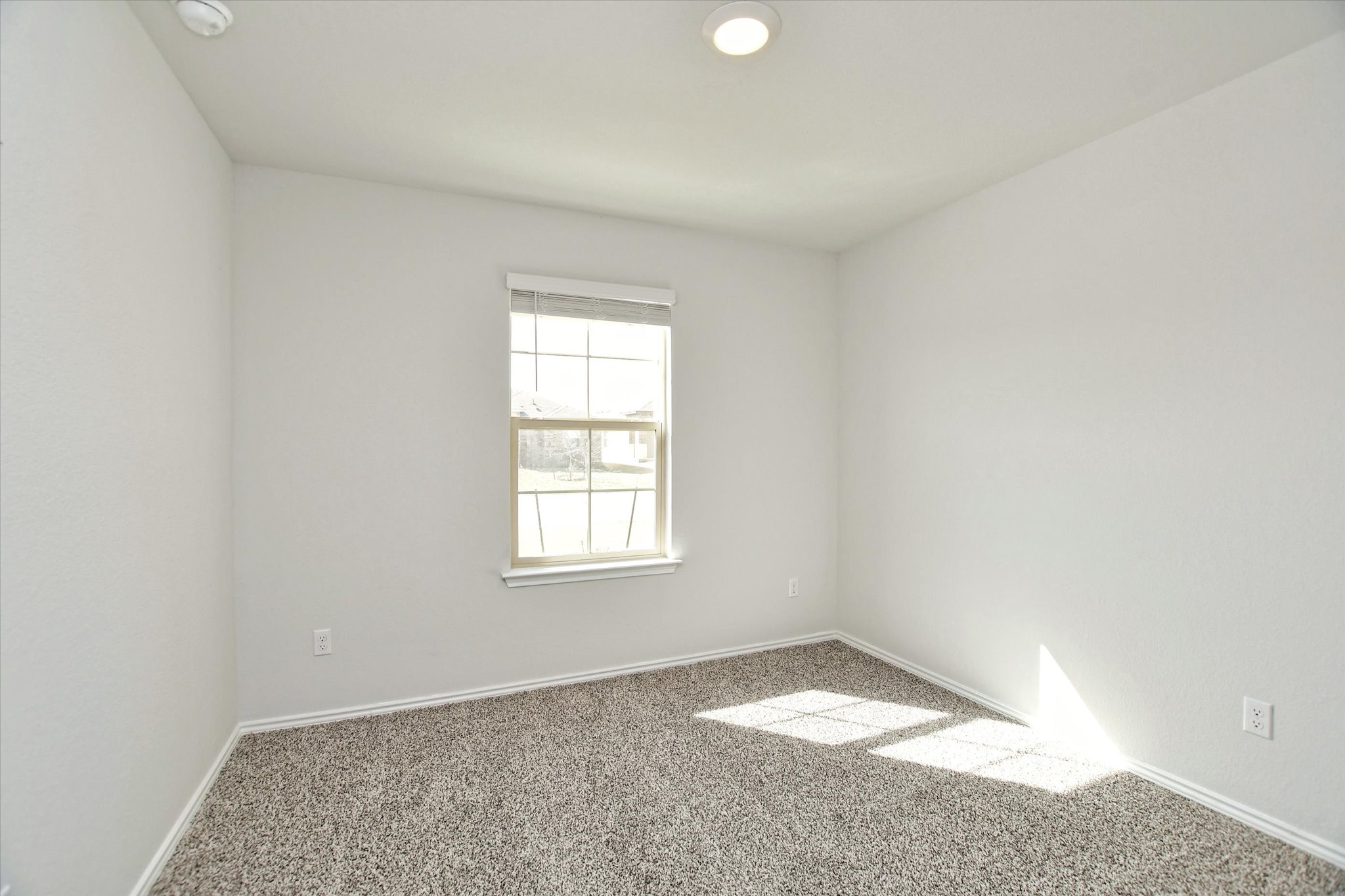 508 Wyatt Way Jarrell, TX 76537 - Photo 18 of 27 Third bedroom is an ideal space for guests or a second home office