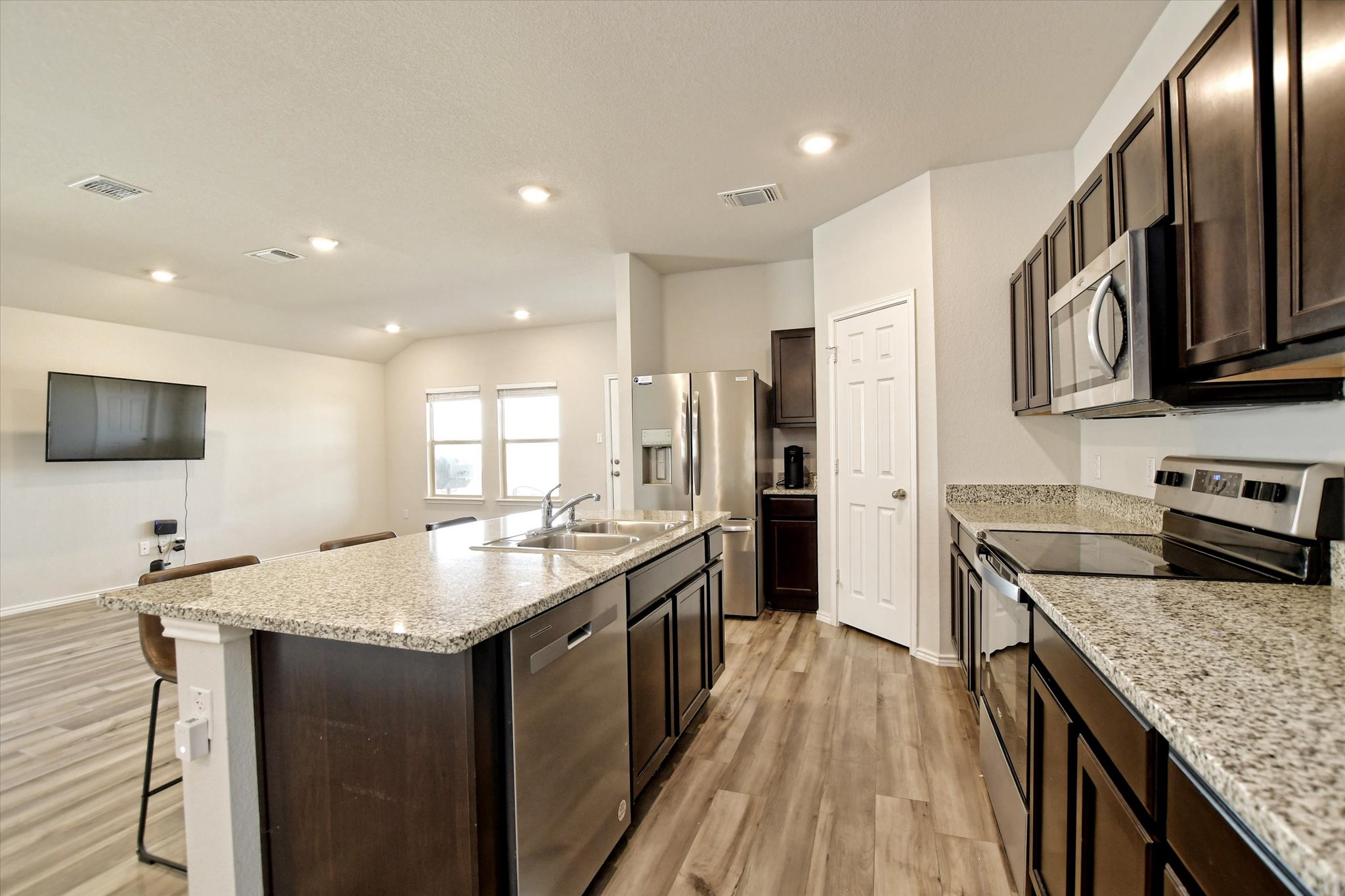 508 Wyatt Way Jarrell, TX 76537 - Photo 8 of 27 Classic finishes and like-new appliances invite a party scene o formal casual dinner.