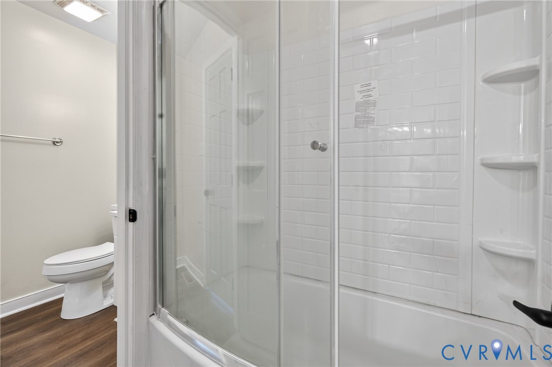 10050 Purcell Road Richmond, VA 23228 - Photo 23 of 26 a bathroom with a toilet and a shower