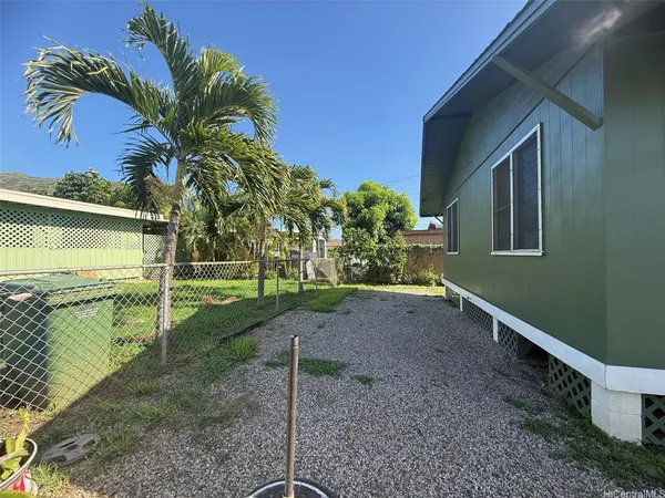 a backyard of a house with lots of green space