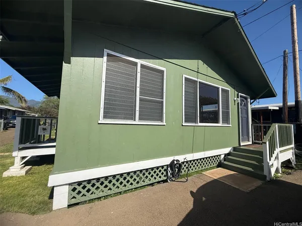 a view of a back yard of the house