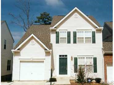 5308 Arete Way Raleigh, NC 27607 - Photo 1 of 1 a view of house with a yard and potted plants