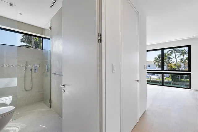 a picture of a bathroom with a shower