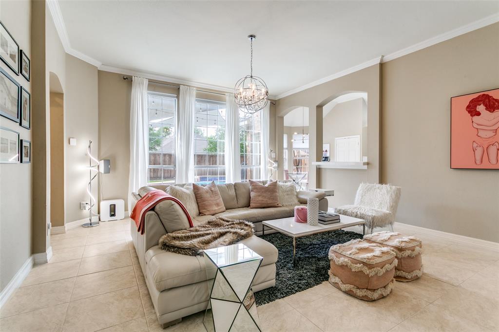 1509 Blue Mesa Road Carrollton, TX 75007 - Photo 11 of 35 a living room with furniture and a large window