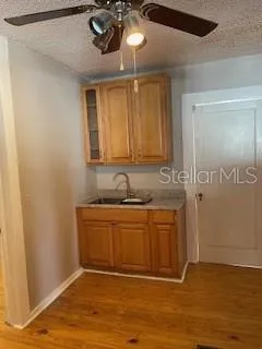 a view of a kitchen with a sink and dishwasher