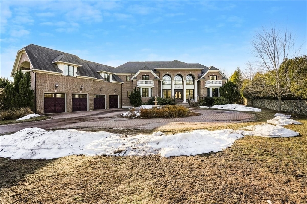 3 Regency Ridge Andover, MA 01810 - Photo 2 of 40 a front view of a house with a yard