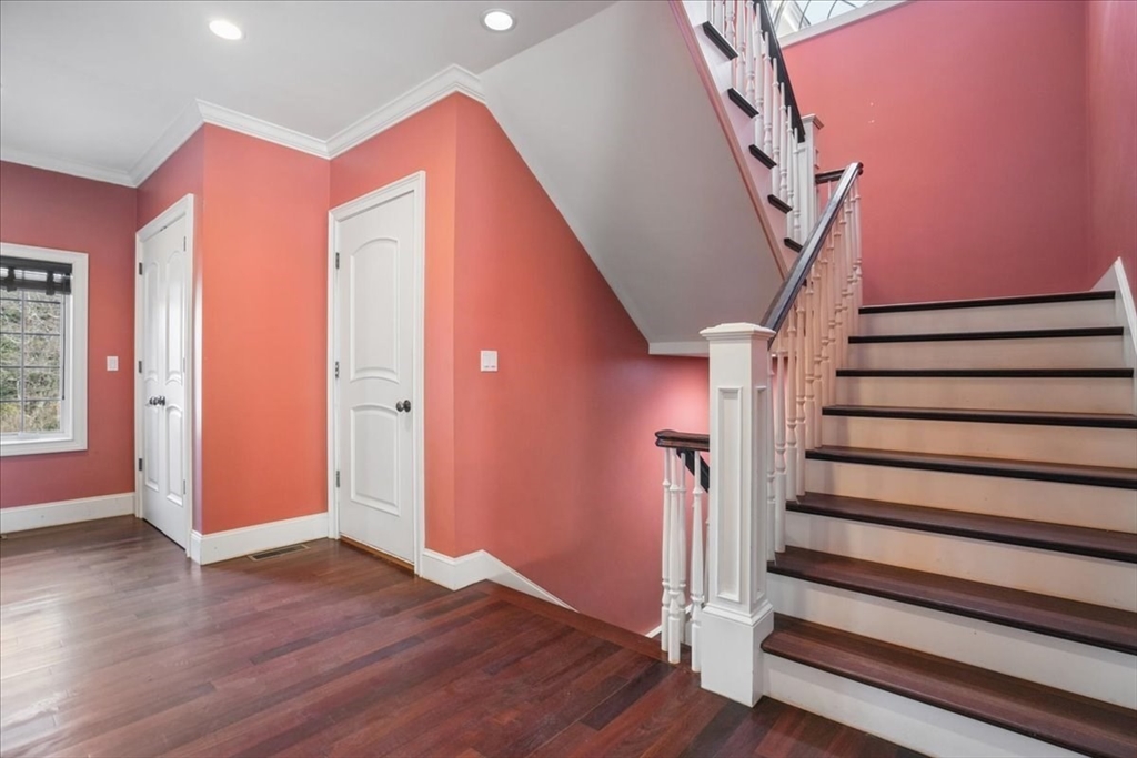 3 Regency Ridge Andover, MA 01810 - Photo 29 of 40 a view of entryway with stairs and wooden floor