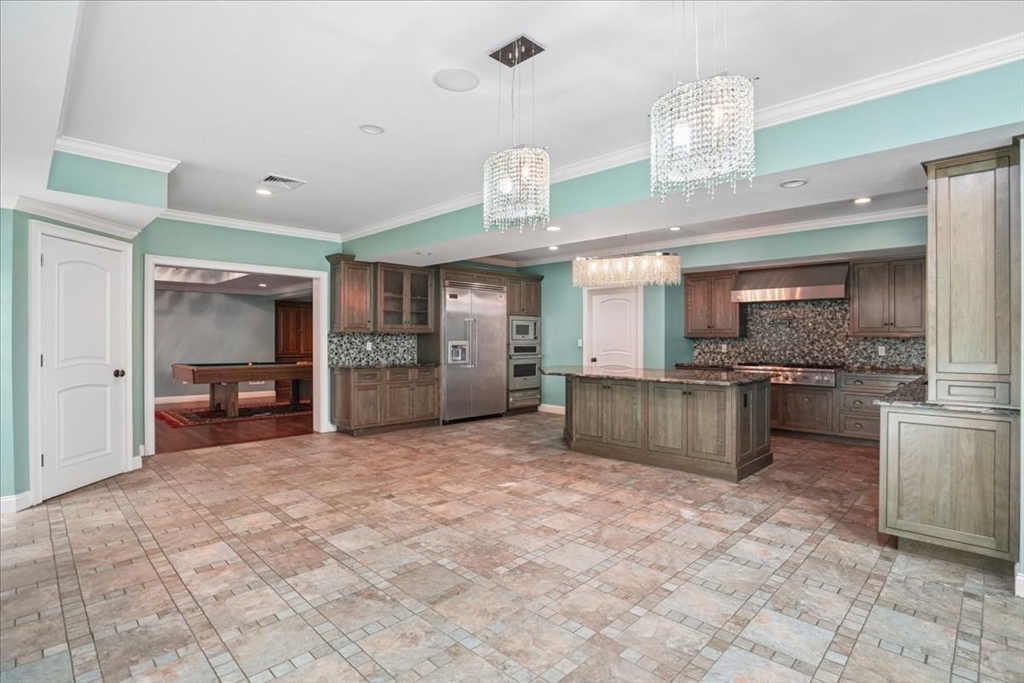 3 Regency Ridge Andover, MA 01810 - Photo 30 of 40 a view of kitchen with refrigerator and window
