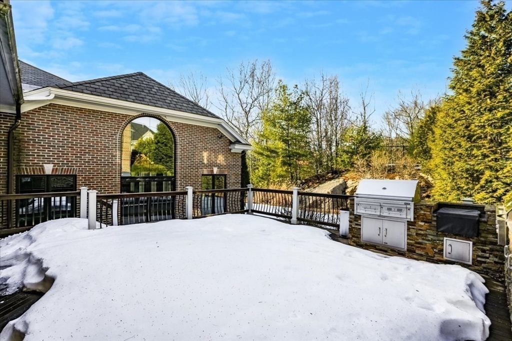 3 Regency Ridge Andover, MA 01810 - Photo 35 of 40 a view of a house with a snow in the yard