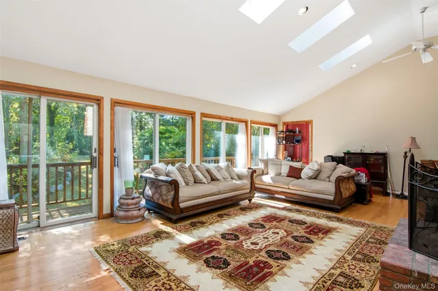 a living room with furniture and a rug