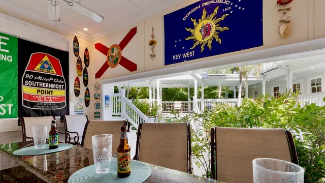 a view of an chairs and tables in patio