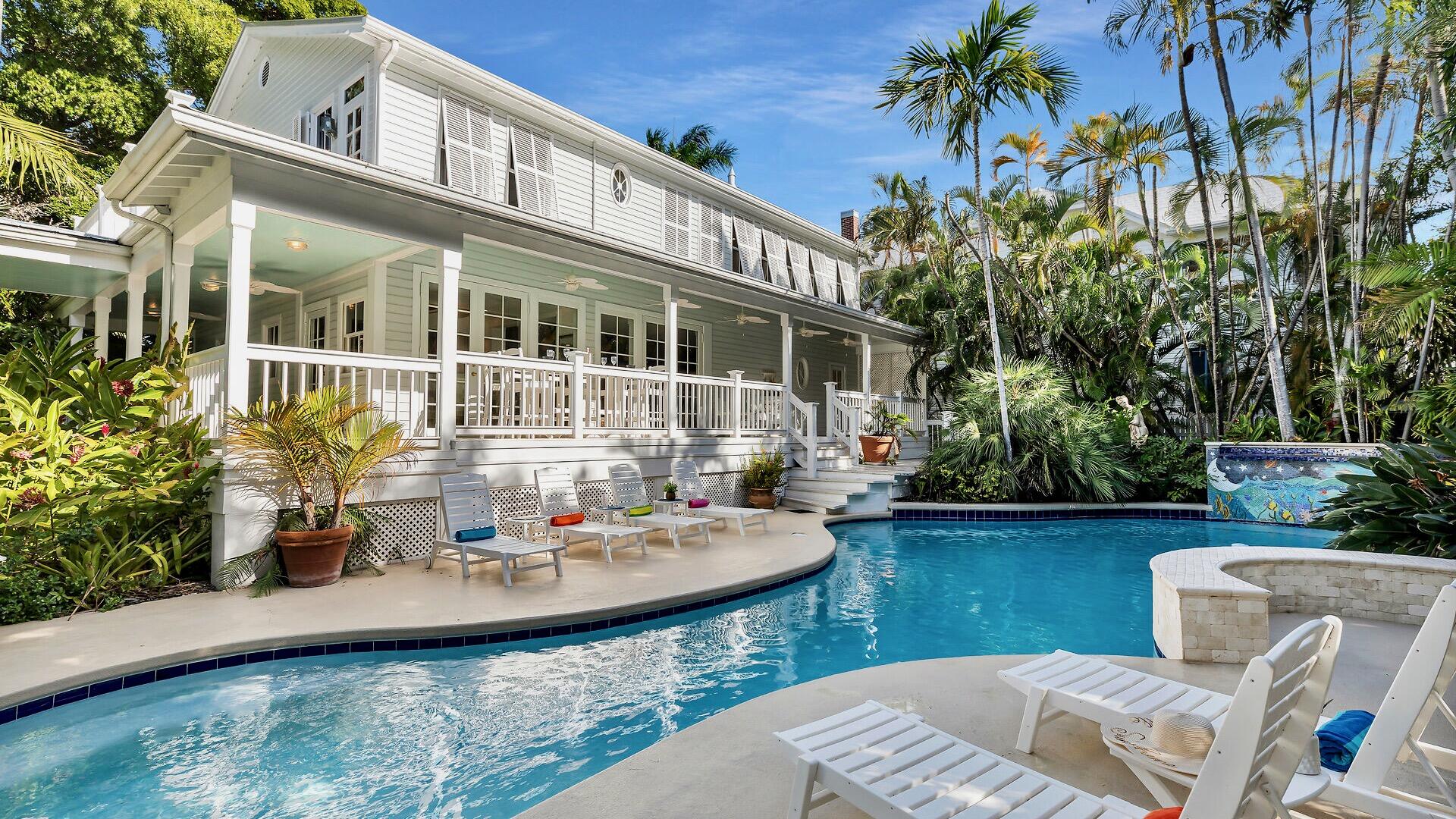 326 Caroline Street Key West, FL 33040 - Photo 17 of 47 a view of house with swimming pool and sitting area